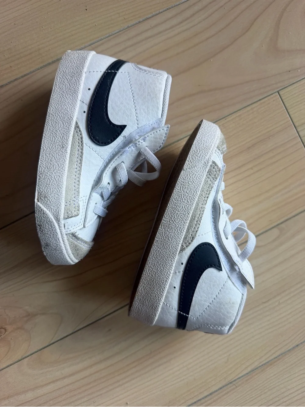 Nike Kids White High-Top Sneakers with Black Swoosh Accent